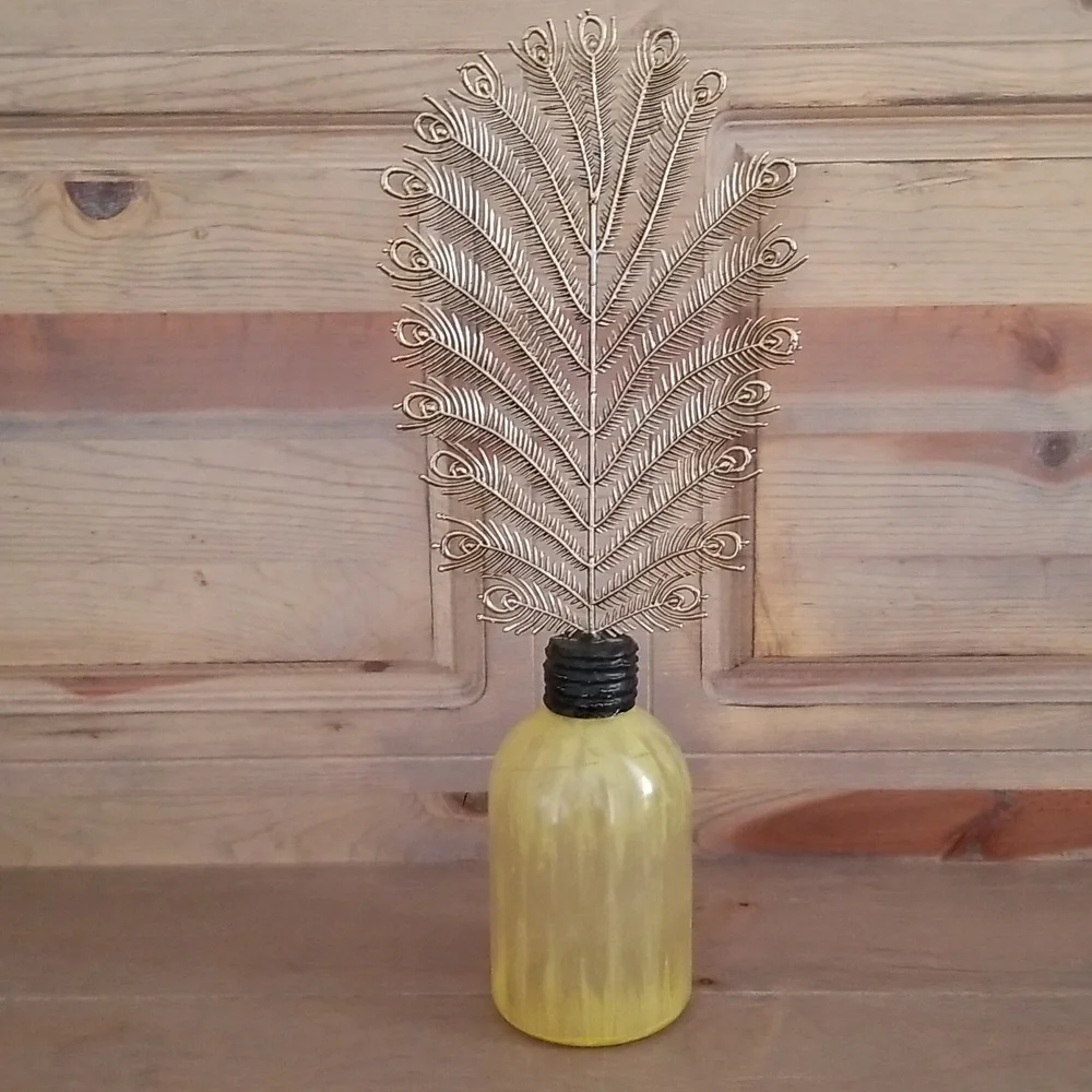 Pottery Barn painted bottle with plume finial